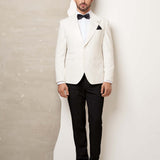 Ivory tuxedo with white peak lapels
